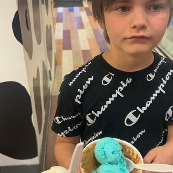 Lake City Creamery - a young boy holding a bowl of ice cream - Ice Cream & Frozen Yogurt Near Me - Celina, Ohio