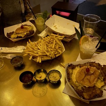 Strange Bird - Fries and tenderloin sandwich - Tiki Bars Near Me - Indianapolis, Indiana Strange Bird - Fries and tenderloin sandwich - Tiki Bars Near Me - Indianapolis, Indiana