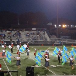 Martinsville High School - The Marching Artesians take the field at a home football game.