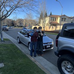 DriveTime Plaza - Kids happy about their first car!!