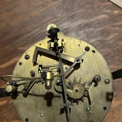 Marion Clock and Watch Repair - Before overhaul ... dark stained tarnished plates.