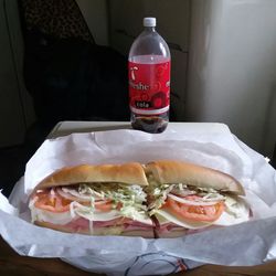 Newfoundland Deli & Catering - My Italian sub is every bit as big as the 2 liter bottle behind out. So delicious !