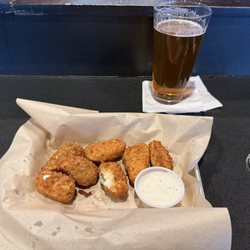 Sports Center Cafe - Bells Two Hearted beer and jalapeño poppers with ranch dressing.
