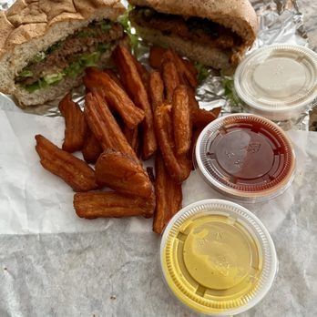 Sunshine's - Sunshine Burger w/ all the fixings & sauces on the side... and Sweet Potato fries...All very Delicious! - Juice Bars & Smoothies Near Me - Houston, Texas