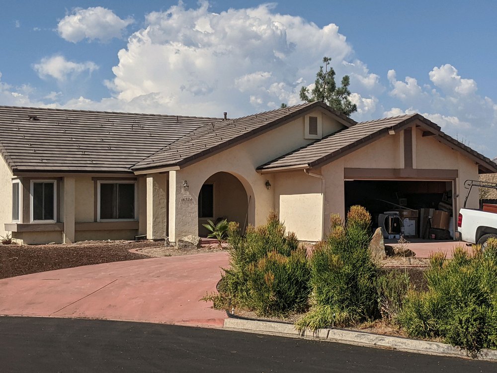 Slide of Weathermaster Roofing Services