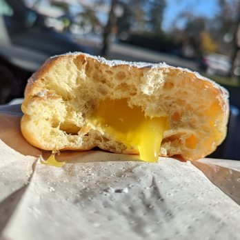 The Jelly Donut - a half eaten doughnut - Donuts Near Me - Cotati, California