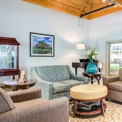 Prema at Ashton Hills - Living area w/ baby grand piano and bird aviary