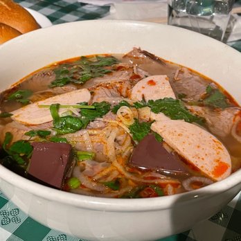 Pho Quynh - a bowl of soup with meat and vegetables - Vietnamese Near Me - Charlotte, North Carolina