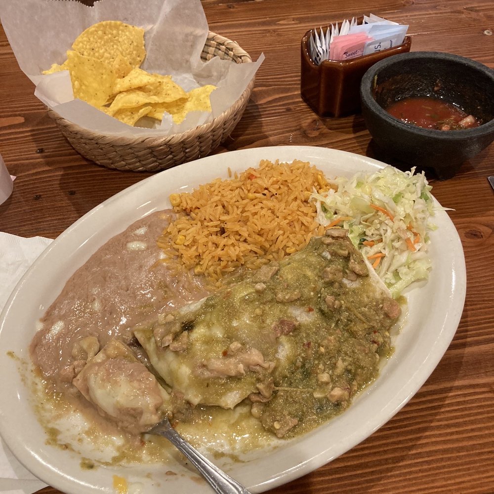 Smothered Asada burrito with green chili
