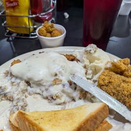 Chicken Fried Steak, mashed taters, fish, and okra. Chicken Fried Steak, mashed taters, fish, and okra.