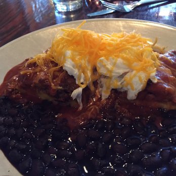 Flo - Pulled pork over tamale. Also very good. - Breakfast & Brunch Near Me - Chicago, Illinois Flo - Pulled pork over tamale. Also very good. - Breakfast & Brunch Near Me - Chicago, Illinois