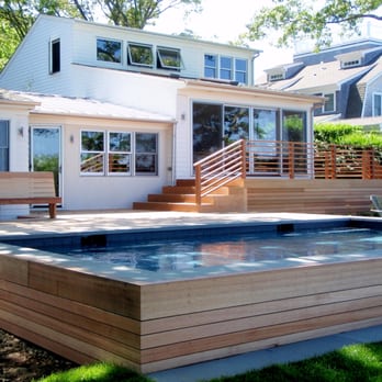 John Glennon - a pool in a backyard - General Contractors Near Me John Glennon - a pool in a backyard - General Contractors Near Me