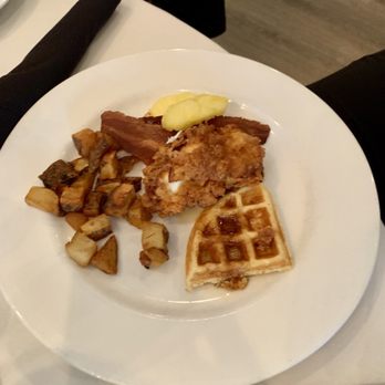 The Mill Kitchen and Bar - Chicken and waffles along with hashbrowns - New American Near Me - Roswell, Georgia The Mill Kitchen and Bar - Chicken and waffles along with hashbrowns - New American Near Me - Roswell, Georgia