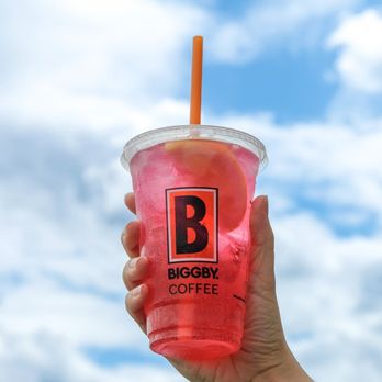 Biggby Coffee - a hand holding a pink drink - Coffee & Tea Near Me - Cold Spring, Kentucky Biggby Coffee - a hand holding a pink drink - Coffee & Tea Near Me - Cold Spring, Kentucky