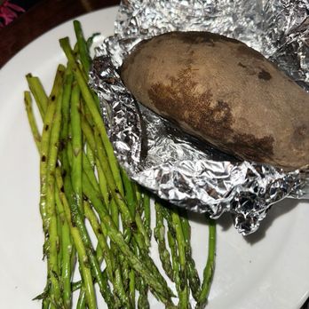 Rustler's Rooste - Jumbo Baked Potato & asparagus - Steakhouses Near Me - Phoenix, Arizona