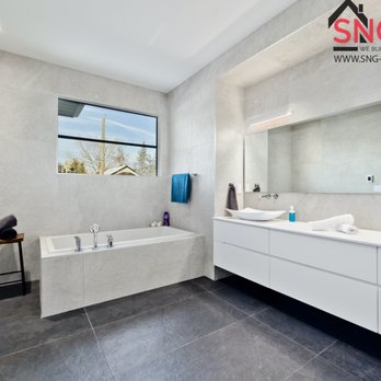 Kings Flooring Solutions - a bathroom with a large window - Flooring Near Me - Calgary, Alberta