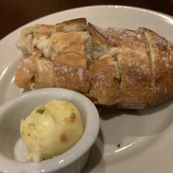 Que Sera - Fresh warm bread with seasoned butter comes out before the meal. - Cajun/Creole Near Me - Black Mountain, North Carolina