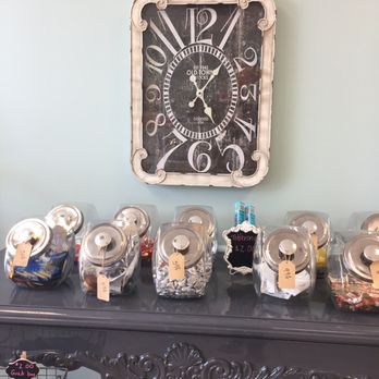 Lolly By Golly Sweet Shoppe - a clock on a wall - Candy Stores Near Me - Dearborn, Michigan Lolly By Golly Sweet Shoppe - a clock on a wall - Candy Stores Near Me - Dearborn, Michigan