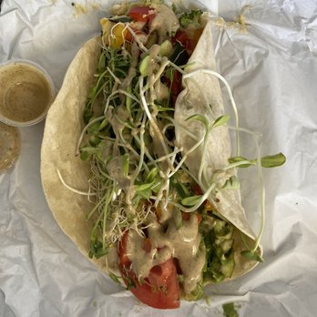 Good Food Conspiracy - Avacado hummus wrap - Juice Bars & Smoothies Near Me - Big Pine Key, Florida Good Food Conspiracy - Avacado hummus wrap - Juice Bars & Smoothies Near Me - Big Pine Key, Florida