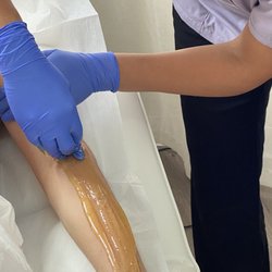 Sugar Body - Sugaring hair removal in process
