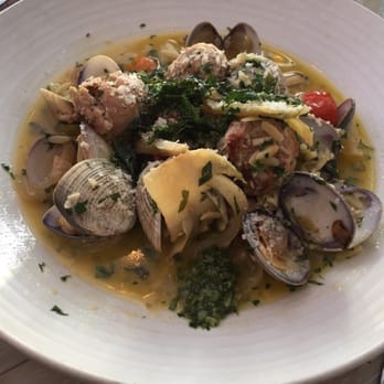Driftwood Kitchen - Clams and meatballs over orzo. - Seafood Near Me - Laguna Beach, California Driftwood Kitchen - Clams and meatballs over orzo. - Seafood Near Me - Laguna Beach, California