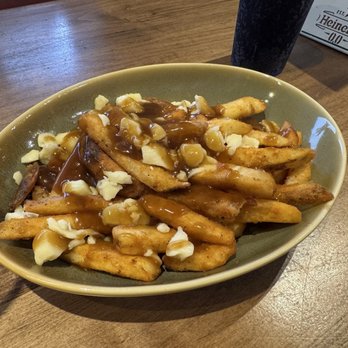 Mick & Angelo's Eatery & Bar - Poutine - Bars Near Me - Niagara Falls, Ontario Mick & Angelo's Eatery & Bar - Poutine - Bars Near Me - Niagara Falls, Ontario