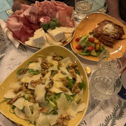Charcuterie board, eggplant parmigiana and pear walnut salad