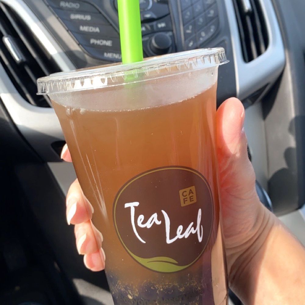 Tea Leaf Cafe - Large ginger-peach fruit bubble tea with double bubbles. - Coffee & Tea Near Me - Amherst, New York Tea Leaf Cafe - Large ginger-peach fruit bubble tea with double bubbles. - Coffee & Tea Near Me - Amherst, New York