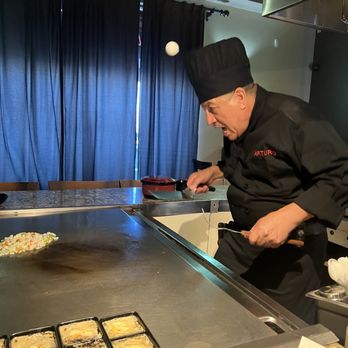 Sayaka Japanese Restaurant - Part of the show is Arturo flipping an egg into his hat. - Bars Near Me - Colton, California Sayaka Japanese Restaurant - Part of the show is Arturo flipping an egg into his hat. - Bars Near Me - Colton, California