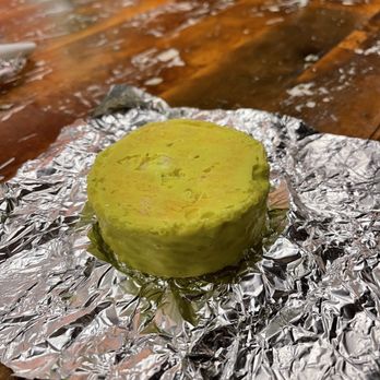 MOD Pizza - a green cake on tin foil - Fast Food Near Me - Richmond, Texas MOD Pizza - a green cake on tin foil - Fast Food Near Me - Richmond, Texas