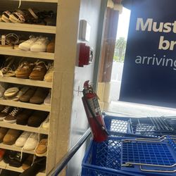 Ross Dress For Less - Fire extinguisher blocked by carts!!! Just leaning against the wall smh