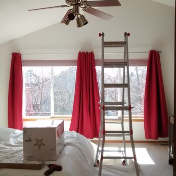 Handyman Joe - Preparing to install new high end modern ceiling fan on cathedral ceiling in bedroom. - Handyman Near Me Handyman Joe - Preparing to install new high end modern ceiling fan on cathedral ceiling in bedroom. - Handyman Near Me