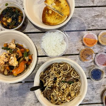 Chiko - bowls of food on a wooden table - Korean Near Me - Bethesda, Maryland