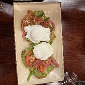 Fork Lore - Avocado Toast with 2 poached eggs - Breakfast & Brunch Near Me - Asheville, North Carolina Fork Lore - Avocado Toast with 2 poached eggs - Breakfast & Brunch Near Me - Asheville, North Carolina