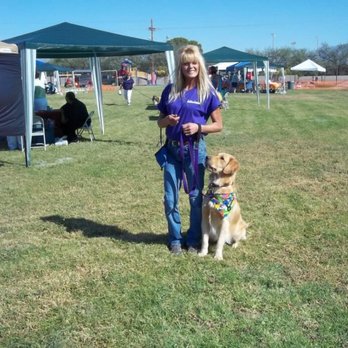Herndon's Hounds - Andi and Bodie at pet event. - Pet Training Near Me