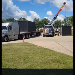 Liberty Towing Service - Liberty Towing unloading the containers