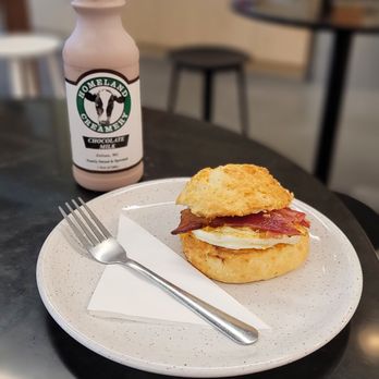 Jubala Coffee - Bacon, Egg and Cheese Biscuit with a chocolate milk by local biz, Homeland Creamery - Coffee & Tea Near Me - Raleigh, North Carolina Jubala Coffee - Bacon, Egg and Cheese Biscuit with a chocolate milk by local biz, Homeland Creamery - Coffee & Tea Near Me - Raleigh, North Carolina