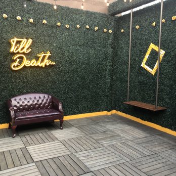 Rec Room - a purple couch and a green wall - Dance Clubs Near Me - Buffalo, New York