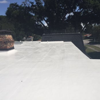 Sky Light Roofing - This is a pure silicon sealant over a conventional roof. - Roofing Near Me - Orlando, Florida