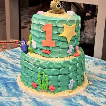 Lori's Piece of Cake - 1st Birthday Finding Nemo with Lemon Cake and Vanilla Custard on the bottom and chocolate cake with vanilla custard on the top - Bakeries Near Me Lori's Piece of Cake - 1st Birthday Finding Nemo with Lemon Cake and Vanilla Custard on the bottom and chocolate cake with vanilla custard on the top - Bakeries Near Me