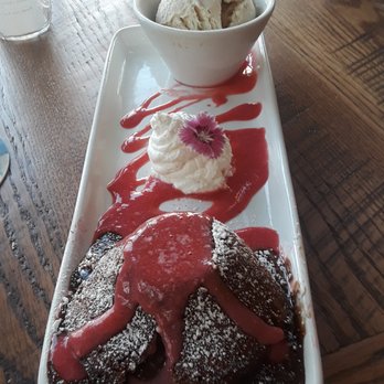 Foster's Kitchen Waikoloa - Lava cake with Tahitian ice cream...surprisingly bland - American Near Me - Waikoloa, Hawaii Foster's Kitchen Waikoloa - Lava cake with Tahitian ice cream...surprisingly bland - American Near Me - Waikoloa, Hawaii