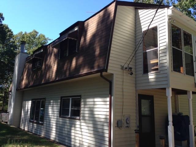 Slide of Todd Nelon Roofing