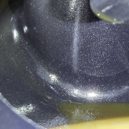 The brown at the bottom is oil pooling, coming from tube at top right -PCV outlet. Can see oil at tip of tube. Right behind throttle body The brown at the bottom is oil pooling, coming from tube at top right -PCV outlet. Can see oil at tip of tube. Right behind throttle body