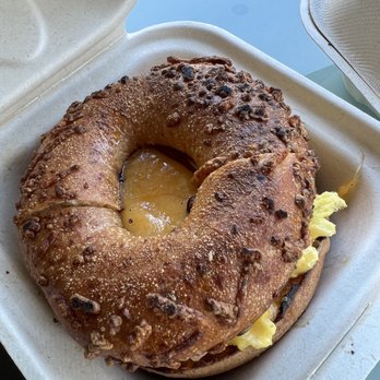 Cinnamon Roll Place - Spam head (fluffy egg, cheese, spam) on cheese bagel - Bakeries Near Me - Kihei, Hawaii