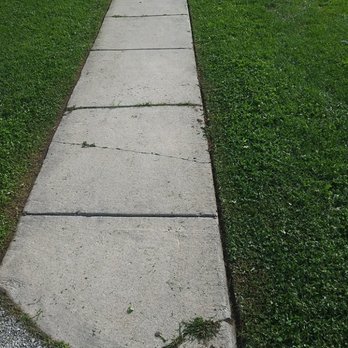 Brian Duffins Lawncare - a sidewalk with a fire hydrant in the background - Lawn Services Near Me Brian Duffins Lawncare - a sidewalk with a fire hydrant in the background - Lawn Services Near Me