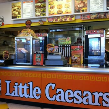 Little Caesars - a little caesars counter with a sign that says little caesars - Pizza Near Me - Florissant, Missouri Little Caesars - a little caesars counter with a sign that says little caesars - Pizza Near Me - Florissant, Missouri