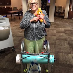 Anderson Nursing & Rehabilitation - I am walking with my son's creative oxygen tank carrier for my walker and damn it doll teddy bear.