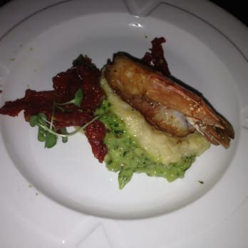 Mezzaluna - Close up: Parma Prosciutto Wrapped Shrimp Mascarpone Polenta & Sundried Tomatoes - New American Near Me - Fargo, North Dakota Mezzaluna - Close up: Parma Prosciutto Wrapped Shrimp Mascarpone Polenta & Sundried Tomatoes - New American Near Me - Fargo, North Dakota