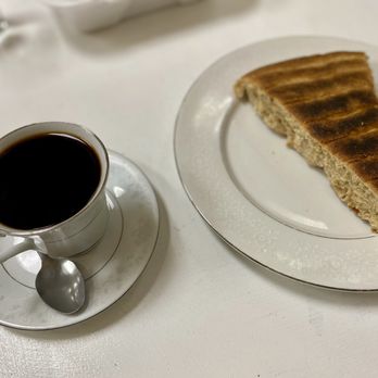 Queen Sheba - Coffee and a slice of sweet bread - African Near Me - Tucson, Arizona