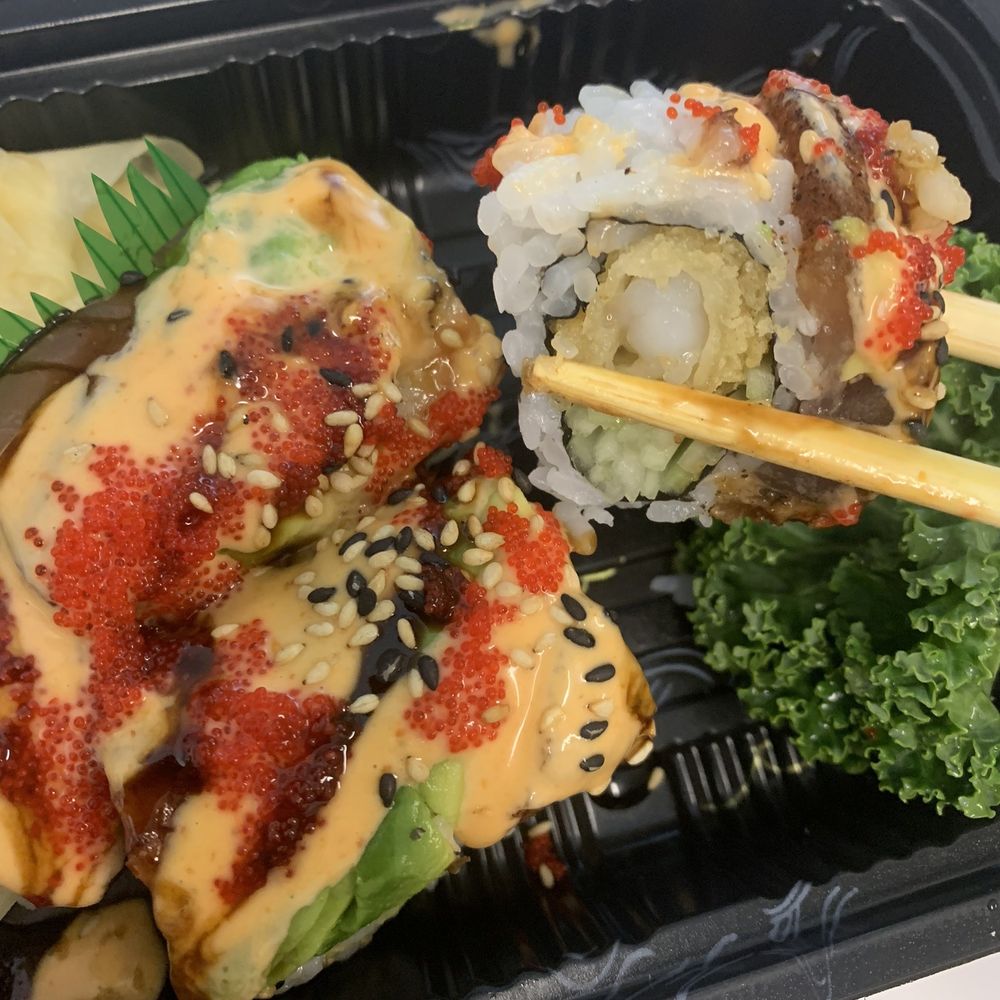 Bento NYC - Flaming Dragon Roll (inside and layers) - Sushi Bars Near Me - New York, New York Bento NYC - Flaming Dragon Roll (inside and layers) - Sushi Bars Near Me - New York, New York